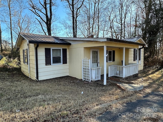 view of front of home featuring covered porch