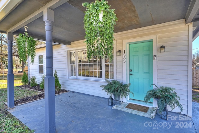 property entrance with a porch