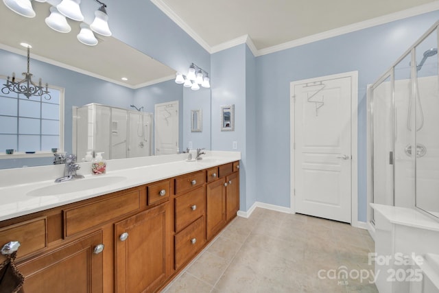 bathroom featuring vanity, a notable chandelier, walk in shower, crown molding, and tile patterned floors