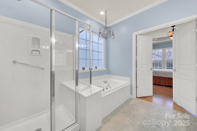 bathroom featuring crown molding and plus walk in shower