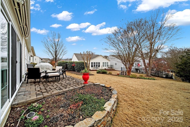 view of yard featuring a patio area