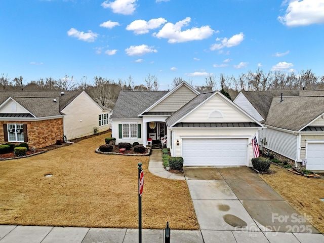 single story home with a garage and a front lawn