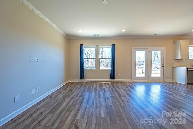 interior space featuring dark hardwood / wood-style flooring and ornamental molding