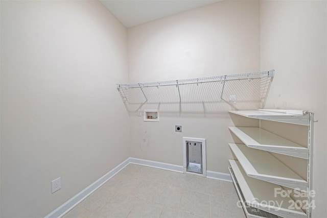 laundry room featuring hookup for an electric dryer and hookup for a washing machine