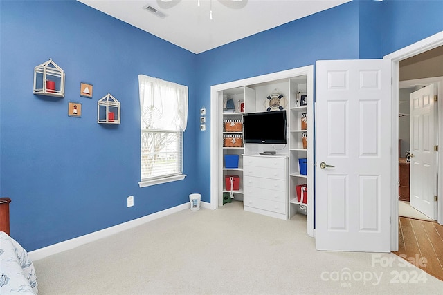 unfurnished bedroom featuring ceiling fan and light hardwood / wood-style flooring