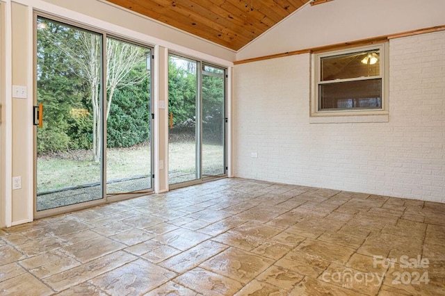 interior space featuring wooden ceiling and vaulted ceiling