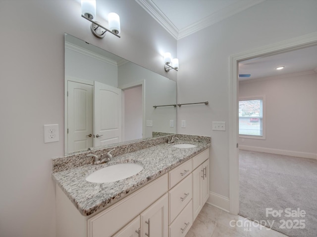 bathroom with vanity and ornamental molding