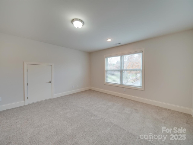 view of carpeted spare room