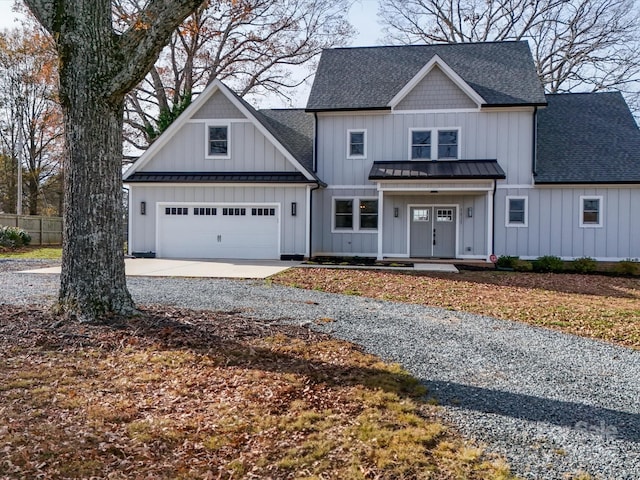 view of front of property with a garage