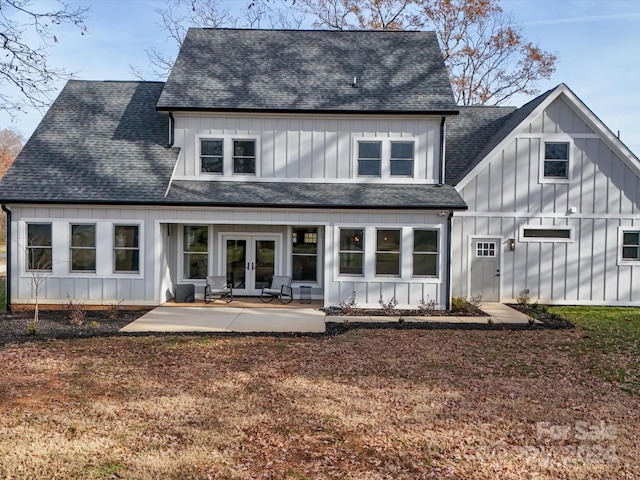 rear view of property with a patio and french doors