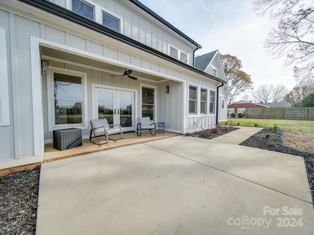 view of patio with french doors and ceiling fan