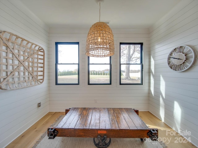 interior space with a healthy amount of sunlight and a chandelier