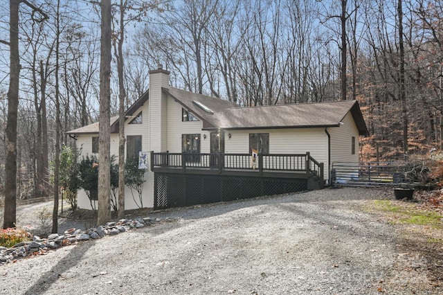 view of front of home featuring a wooden deck