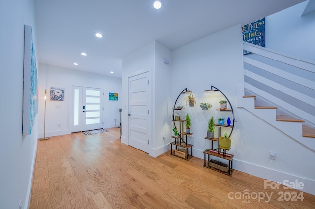 entrance foyer featuring light hardwood / wood-style floors