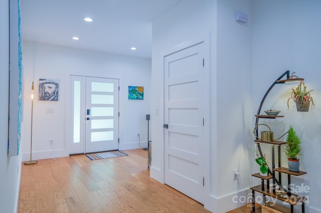 entryway with light hardwood / wood-style flooring