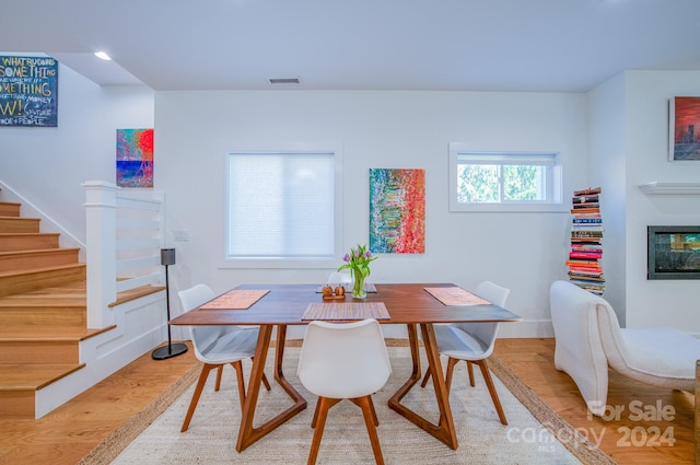 dining area with light hardwood / wood-style flooring