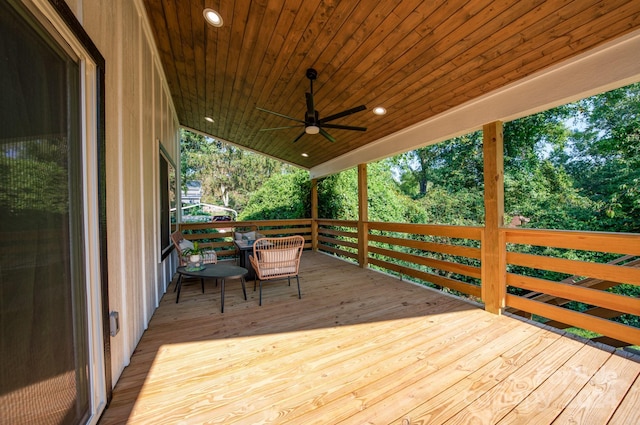 wooden deck with ceiling fan