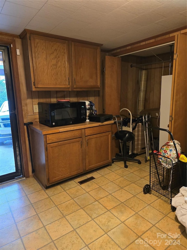 kitchen with wooden walls