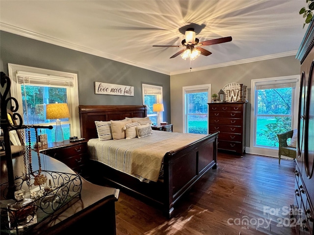 bedroom featuring stainless steel refrigerator, ceiling fan, dark hardwood / wood-style floors, and ornamental molding