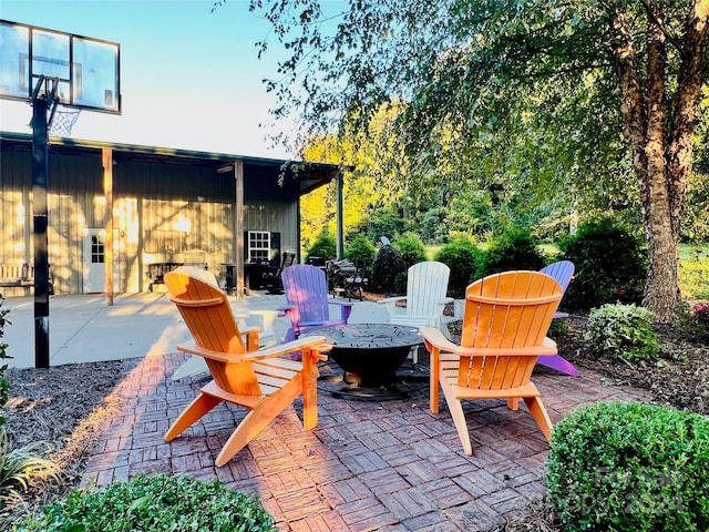 view of patio / terrace with an outdoor fire pit