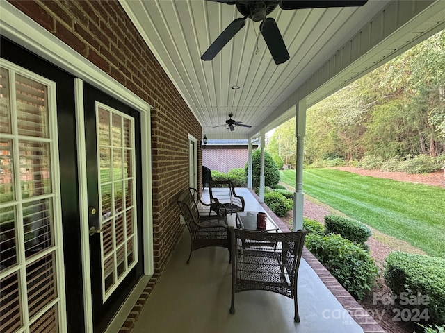 view of patio / terrace with a porch and ceiling fan