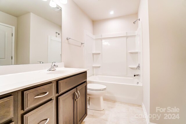 full bathroom featuring vanity, toilet, and shower / washtub combination