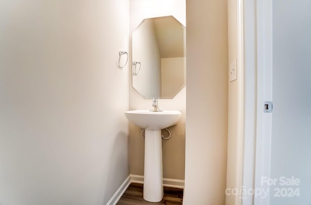 bathroom featuring wood-type flooring