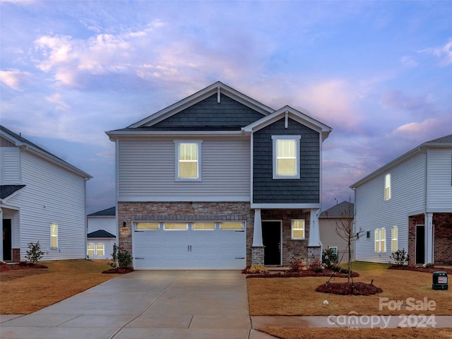 view of front of home with a garage