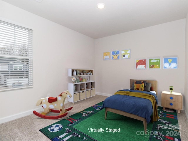 bedroom featuring carpet