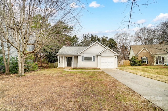 single story home featuring a front yard and a garage