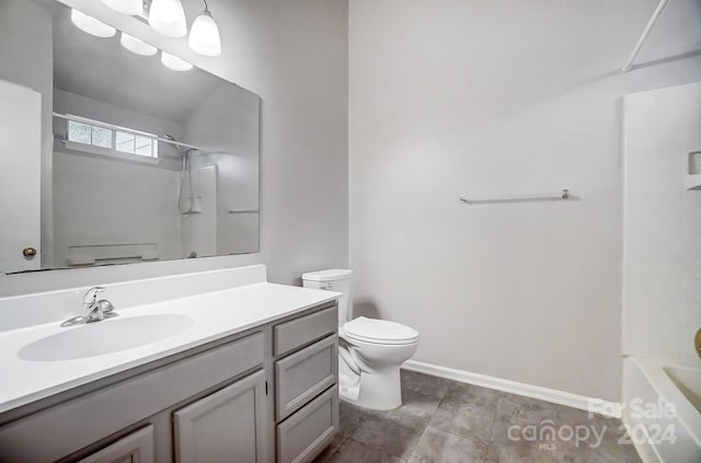 full bathroom with tile patterned flooring, vanity,  shower combination, and toilet