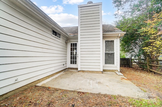 entrance to property with a patio area