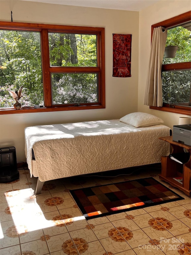 bedroom with a wood stove