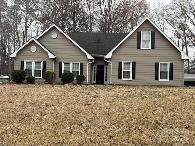 view of front facade with a front yard