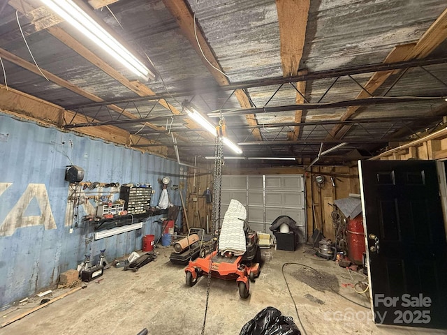 garage featuring a workshop area