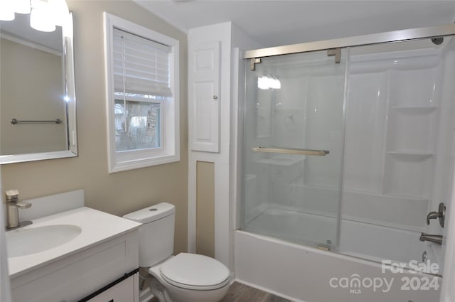 full bathroom with vanity, toilet, enclosed tub / shower combo, and wood-type flooring