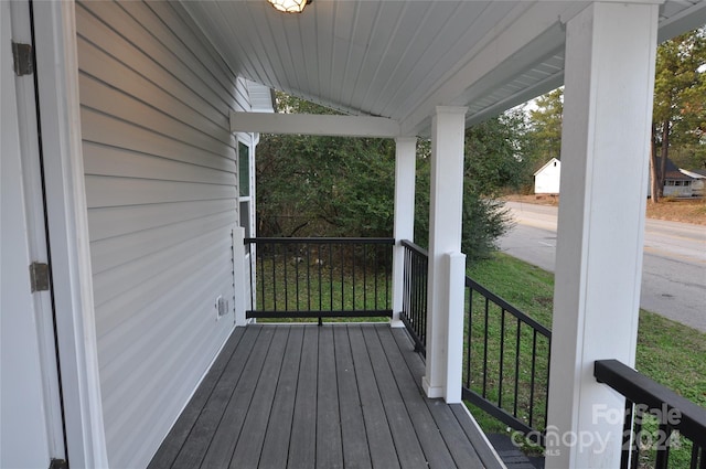 wooden deck featuring a porch