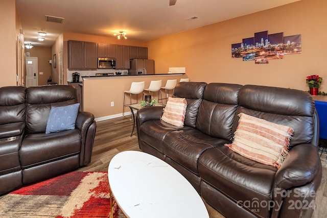 living room with dark wood-type flooring