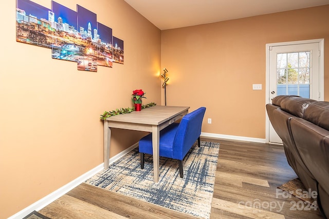 home office with hardwood / wood-style floors