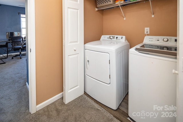 laundry area featuring carpet and washer and clothes dryer