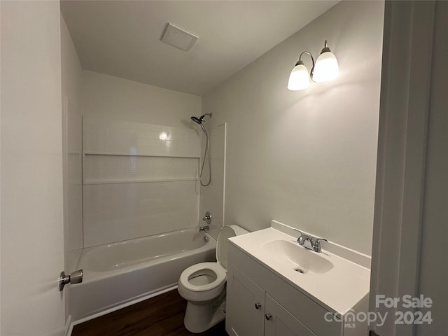 full bathroom with wood-type flooring, vanity, toilet, and shower / washtub combination