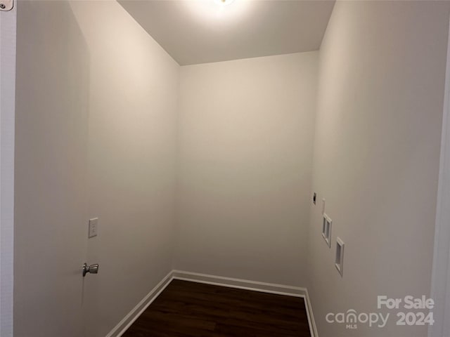 washroom featuring washer hookup, hookup for an electric dryer, and dark wood-type flooring