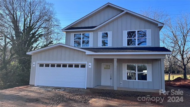 view of front of home with a garage