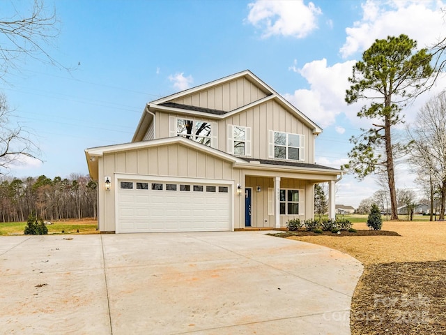 view of front facade with a garage, board and batten siding, and concrete driveway