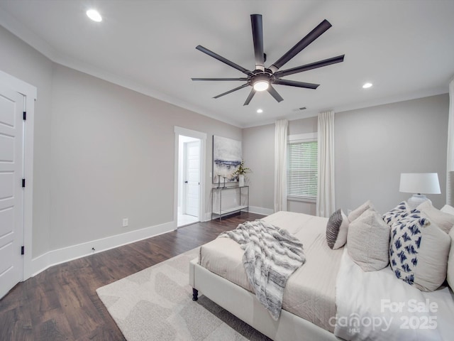 bedroom featuring ceiling fan, dark hardwood / wood-style flooring, and crown molding