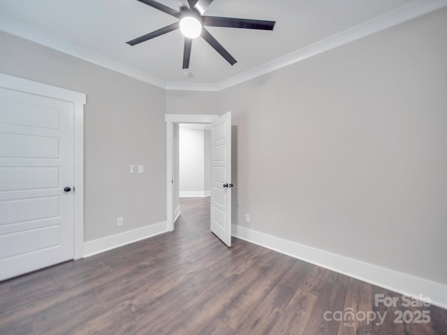 unfurnished room with dark hardwood / wood-style flooring, ceiling fan, and crown molding