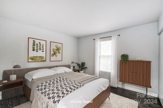 bedroom featuring wood-type flooring