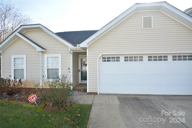 view of front of house with a garage