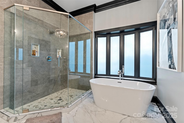 bathroom with crown molding, shower with separate bathtub, and a wealth of natural light