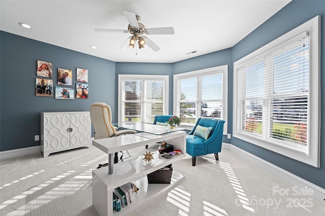 interior space featuring ceiling fan